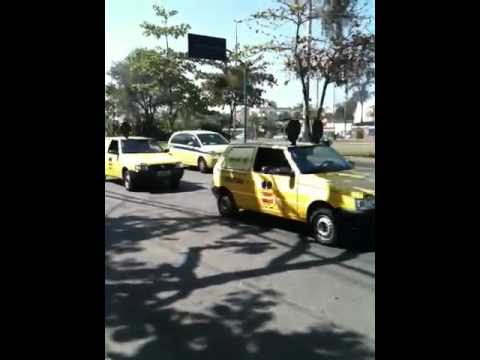 Truly Nolen International on the motorway in Rio de Janeiro 2010. T.N.I exhibits part of its mouse car fleet.